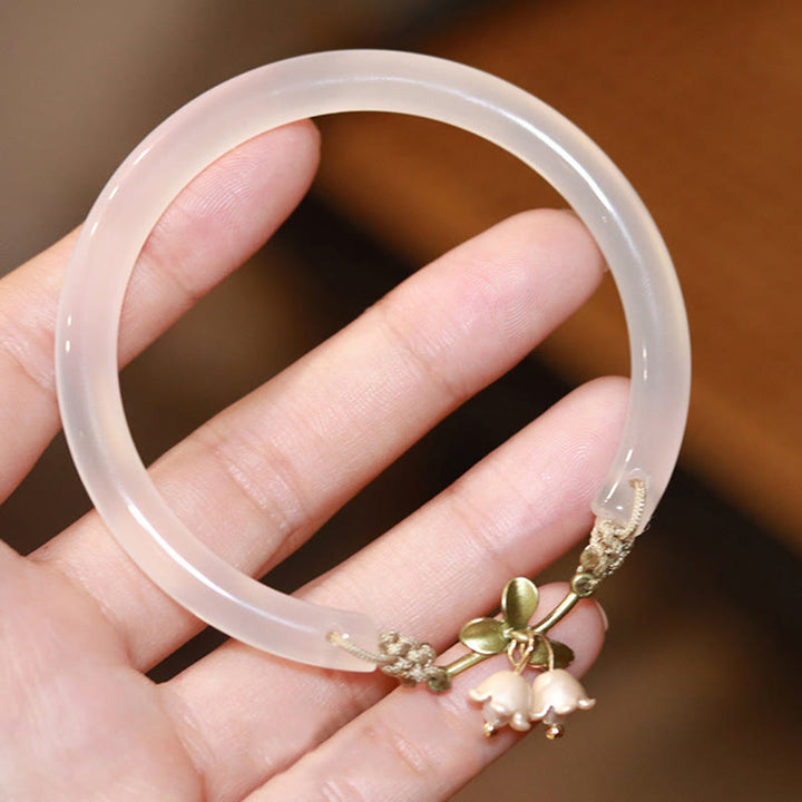 Bracelet jonc de force et de bonheur avec fleur de muguet