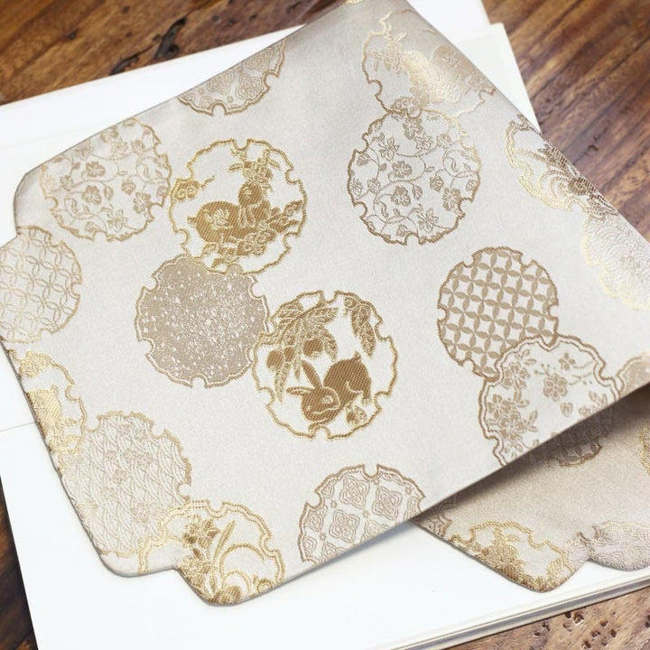 Dessous de verre élégant à motif de brocart floral pour tasse à thé