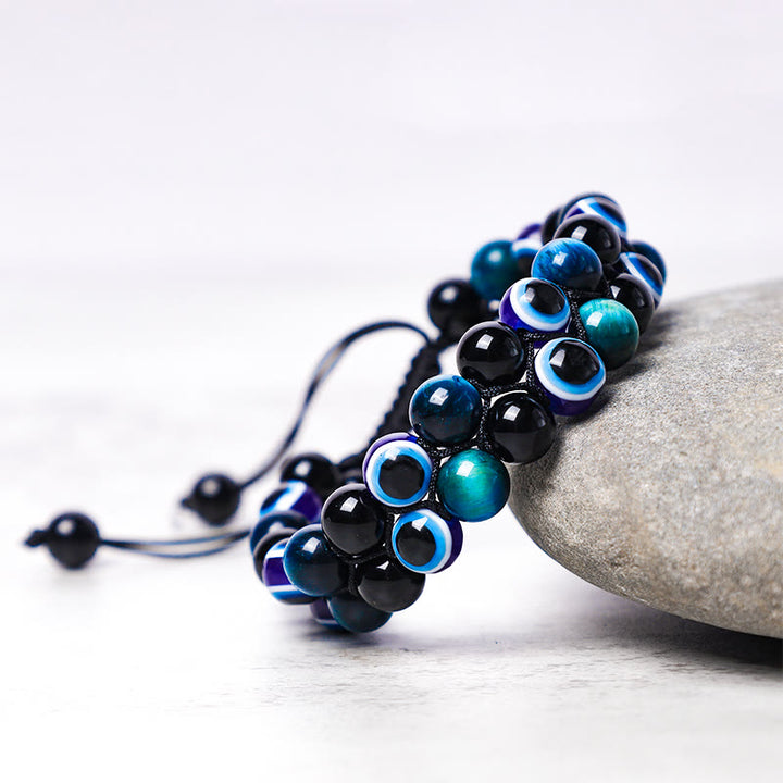 Bracelet de perles de protection contre le mauvais œil en hématite et œil de tigre Buddha Stones