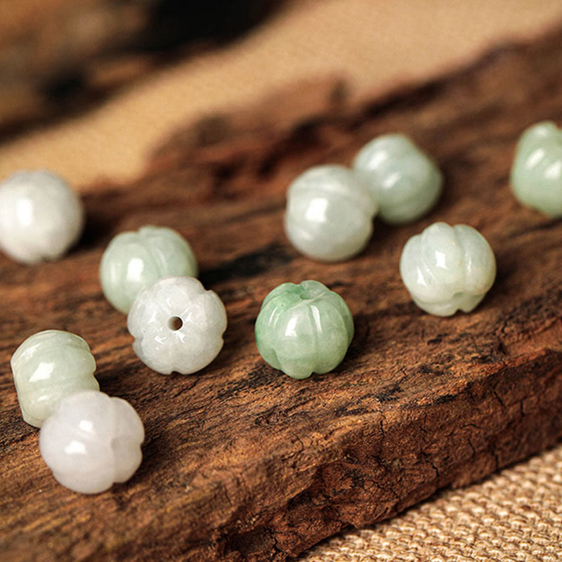 Bracelet tressé en jade blanc avec boucle de paix et perles citrouilles et Buddha Stones