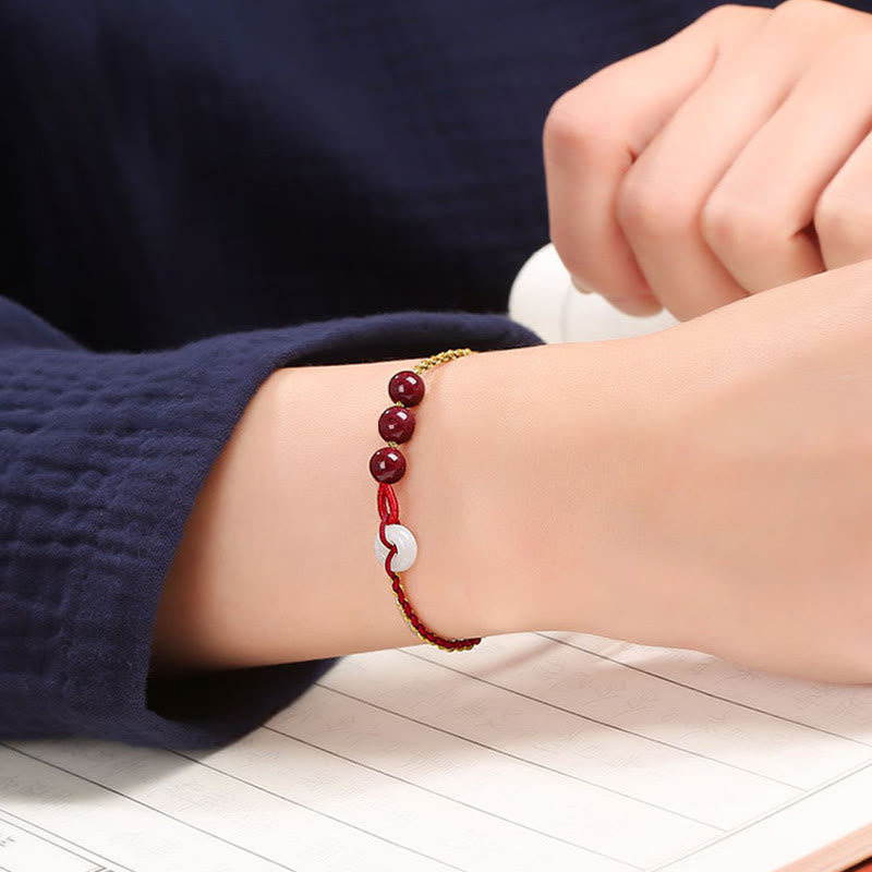 Bracelet de bénédiction avec boucle de paix en jade cinabre naturel de Buddha Stones