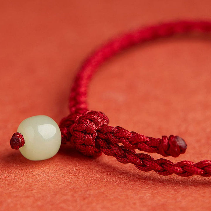 Bracelet en corde avec boucle ronde en Buddha Stones et lotus de jade pour la paix, le bonheur, l'abondance et la richesse