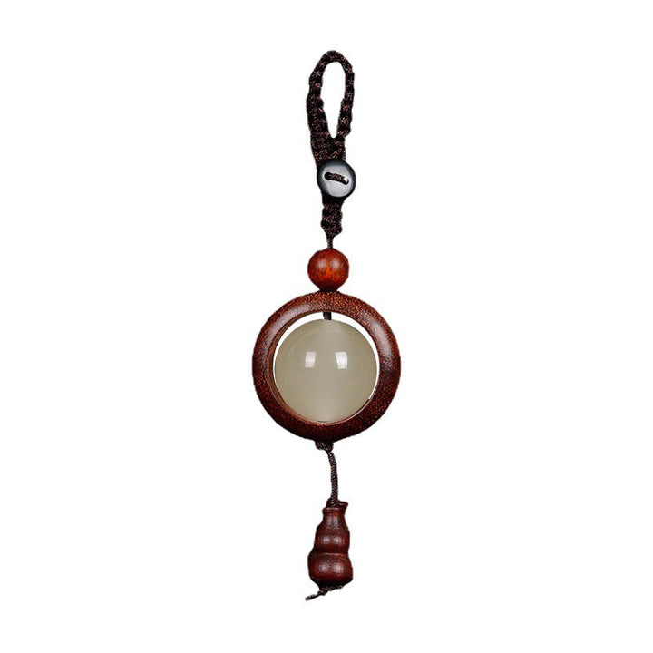 Porte-clés porte-bonheur lumineux en Buddha Stones en bois de santal rouge et bois d'ébène en bois de santal vert