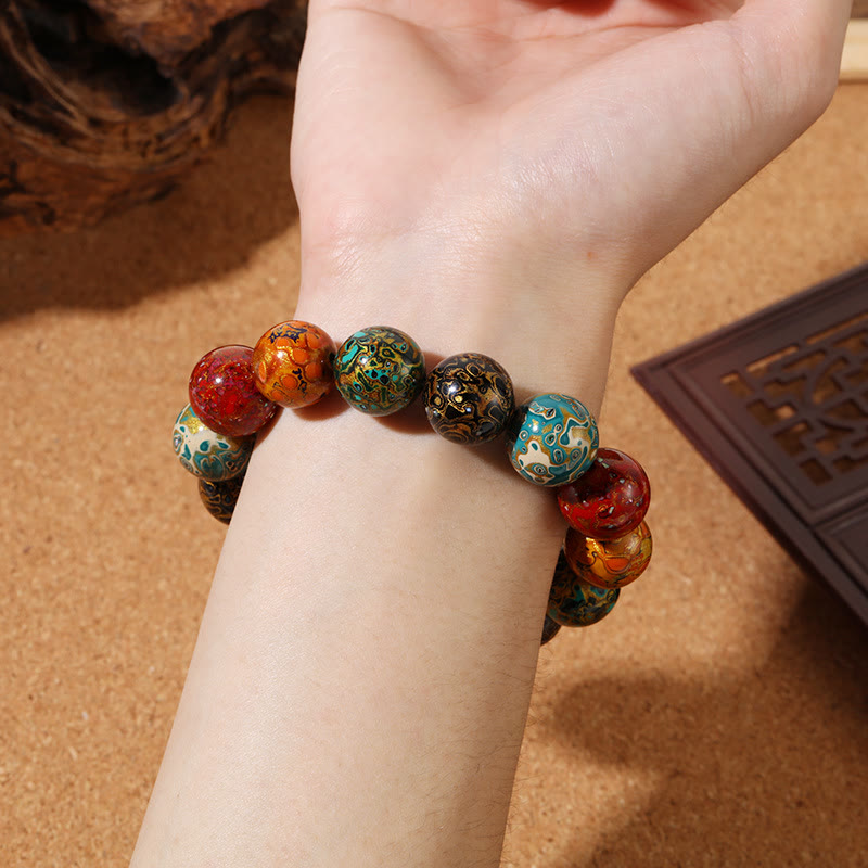 Bracelet calme en perles de laque multicolores naturelles Buddha Stones