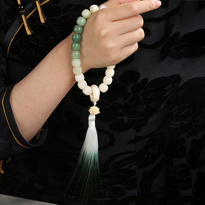 Buddha Stones Dégradé Naturel Graine de Bodhi Fortune Sac d'Argent Sagesse de Lotus Gland Poignet Mala