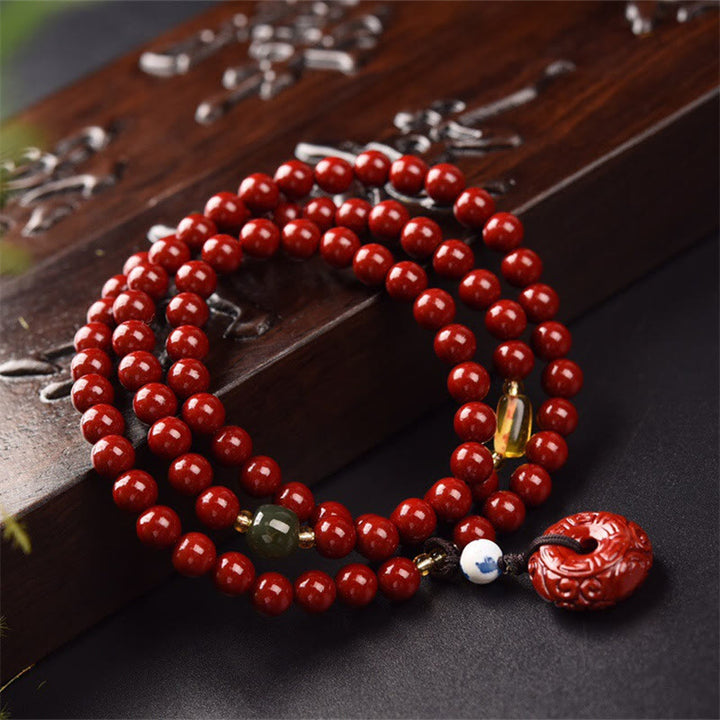 Bracelet Mala tibétain à triple tour avec boucle de paix et Buddha Stones