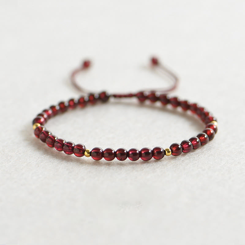 Bracelet de stabilité en perles dorées et grenat naturel avec Buddha Stones - Grenat (Tour de poignet : 14-15 cm) - image 0