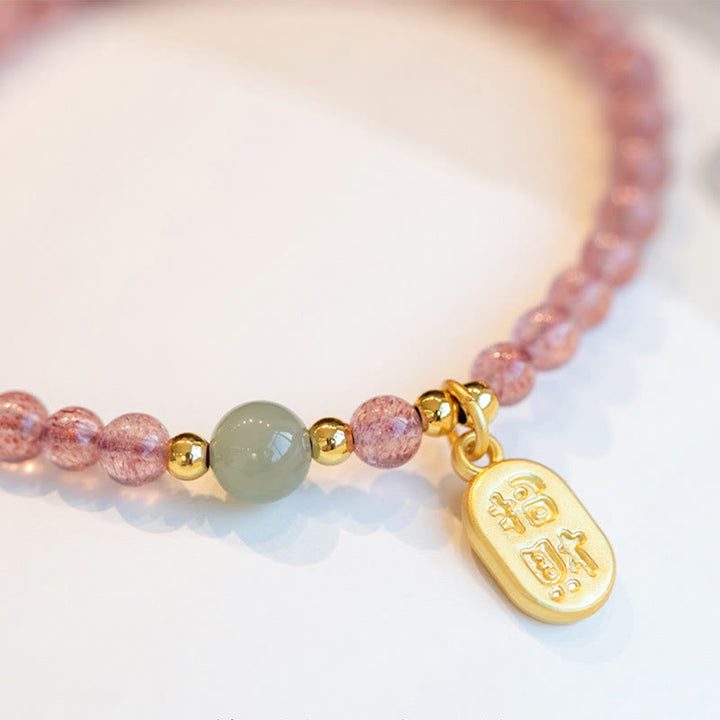 Bracelet porte-bonheur en Buddha Stones, quartz fraise, grenat, jade, caractère Fu