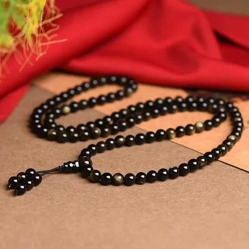 Bracelet de richesse en obsidienne naturelle dorée avec 108 perles de Mala Buddha Stones