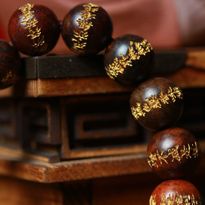 Bracelet de guérison gravé Sutra du cœur en bois de rose tibétain