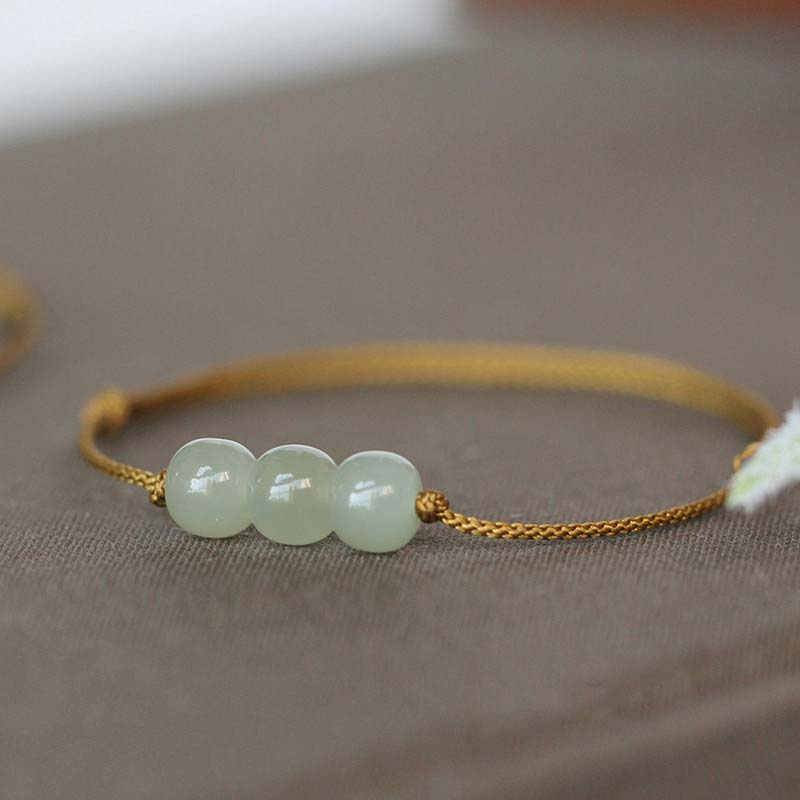 Bracelet tissé en fil de jade à trois perles de Buddha Stones