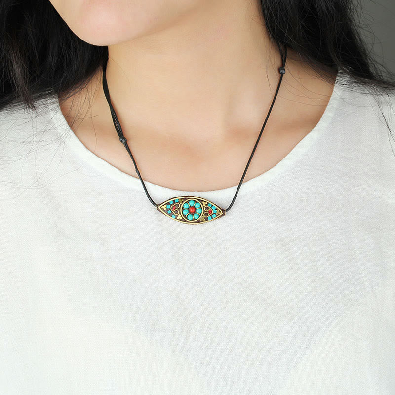 Collier pendentif en perles turquoises du Tibet avec Buddha Stones et motif marquise, protection et force