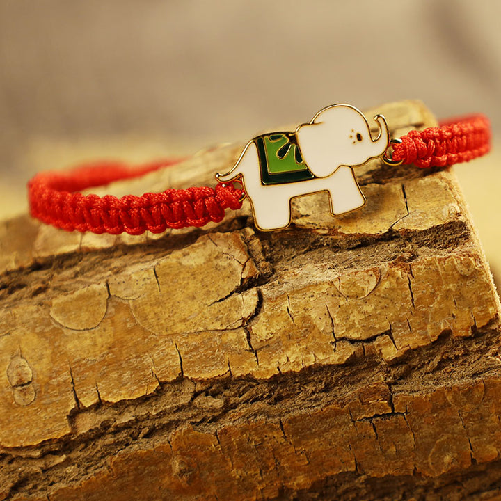 Bracelet tibétain en argent sterling 925 fait main avec des Buddha Stones et un éléphant porte-bonheur rouge
