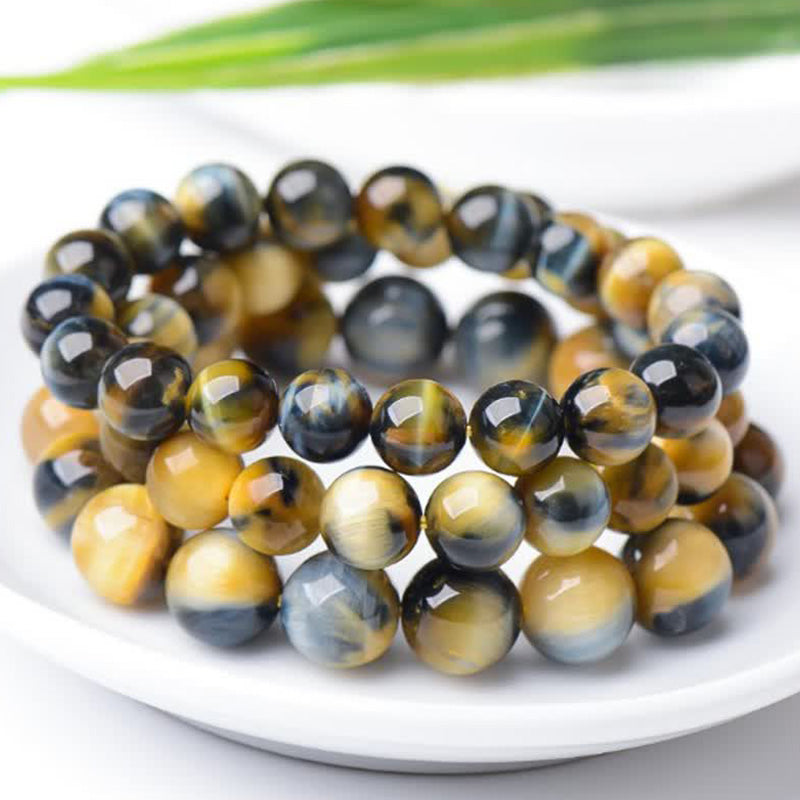 Bracelet de force, de courage et de protection en œil de tigre avec Buddha Stones