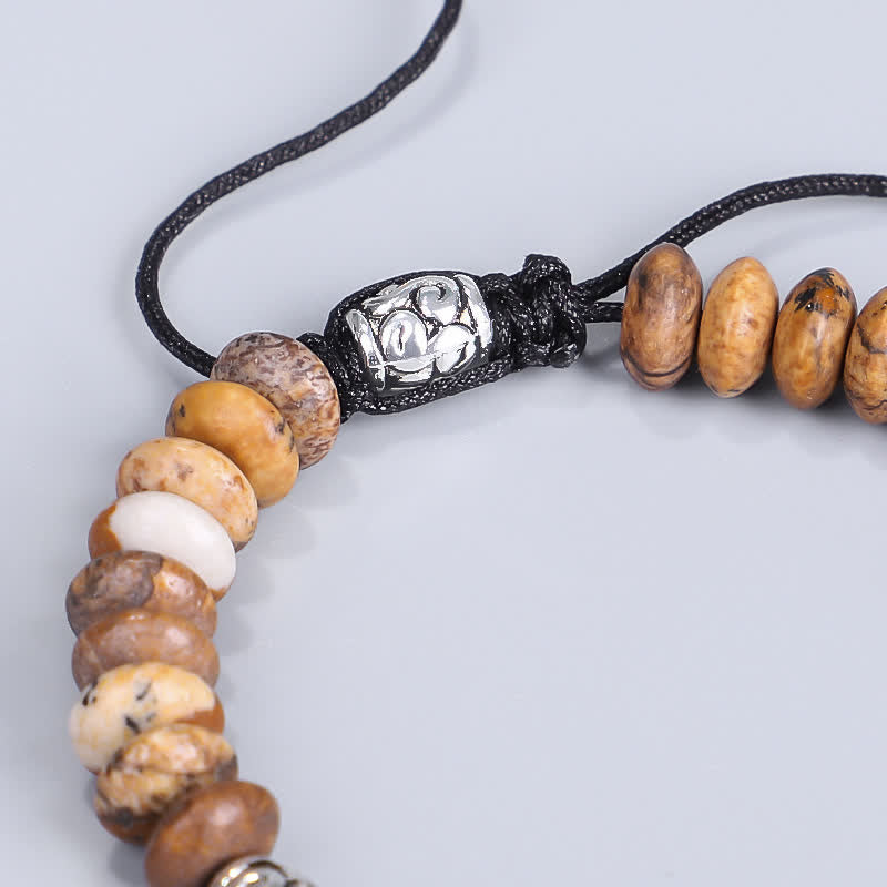 Bracelet en fil de perles positives en jaspe photo