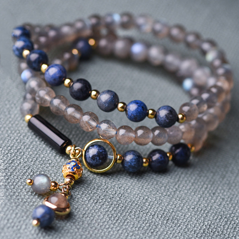 Bracelet apaisant et positif en Buddha Stones, pierre de lune, lazurite et lapis-lazuli - image 0