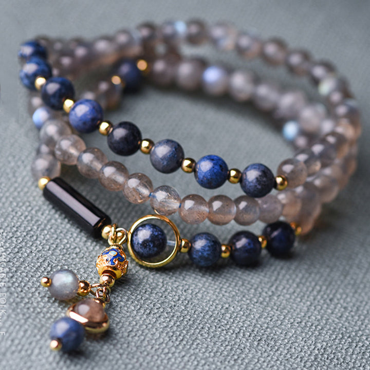Bracelet apaisant et positif en Buddha Stones, pierre de lune, lazurite et lapis-lazuli - image 0