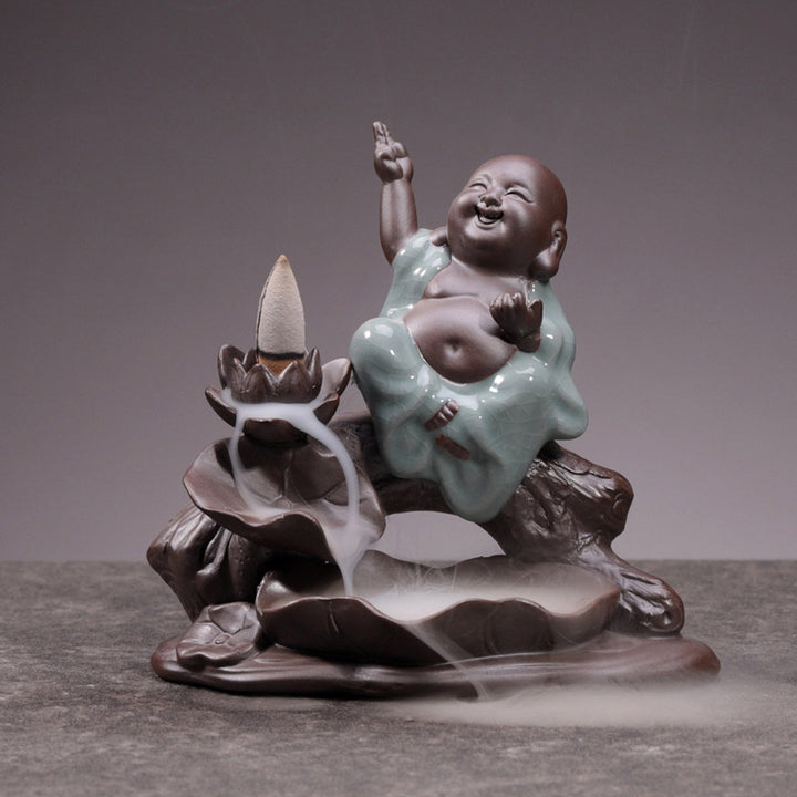 Brûleur d'encens en céramique avec bénédiction de lotus et petit moine en Buddha Stones