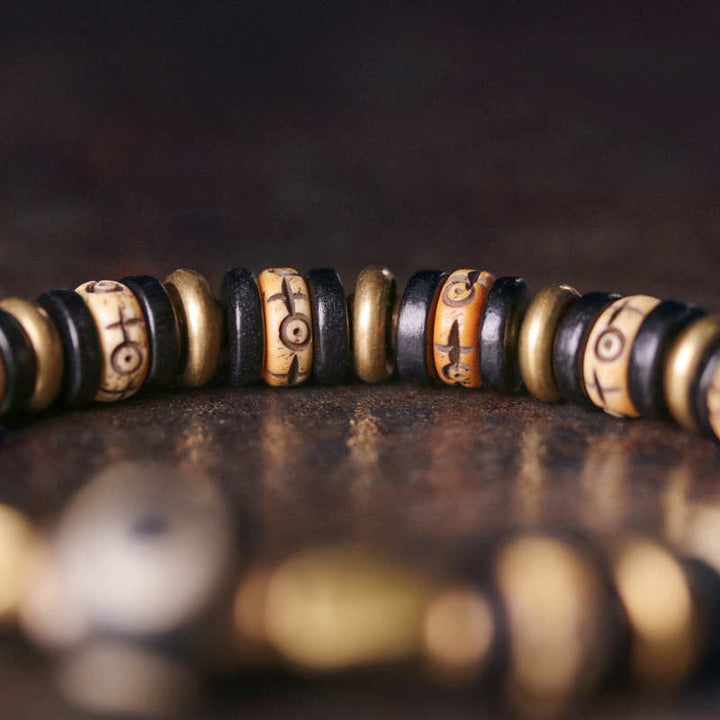 Bracelet de force en bois d'ébène et perles d'os tibétaines en Buddha Stones