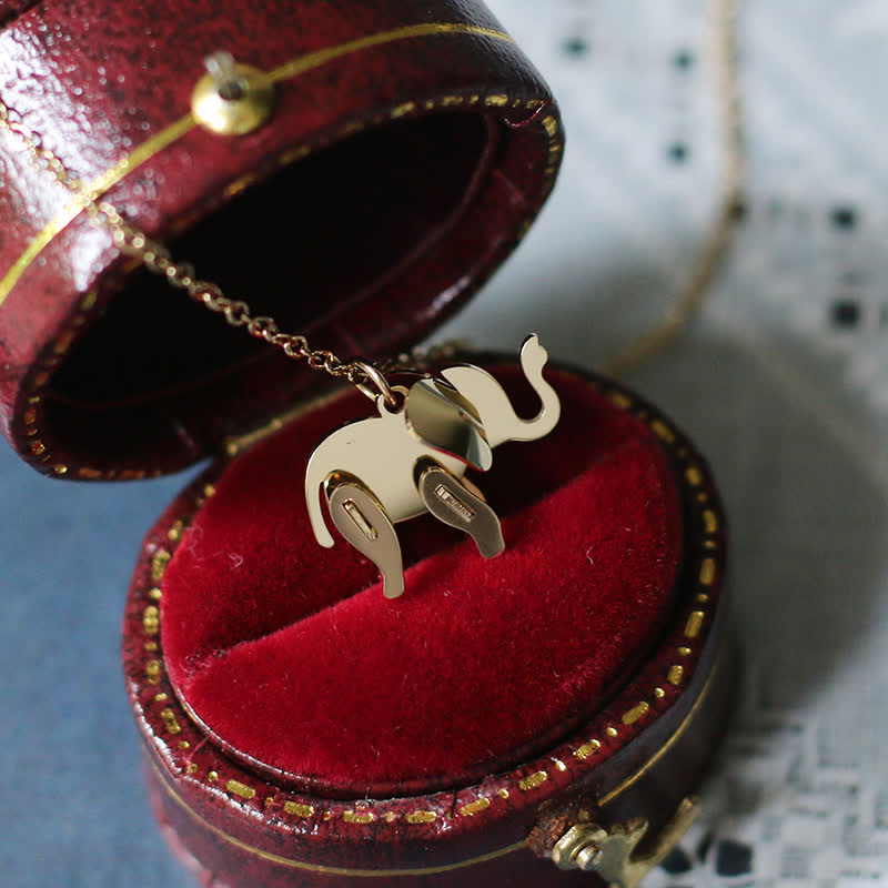Collier porte-bonheur en acier titane avec pendentif éléphant