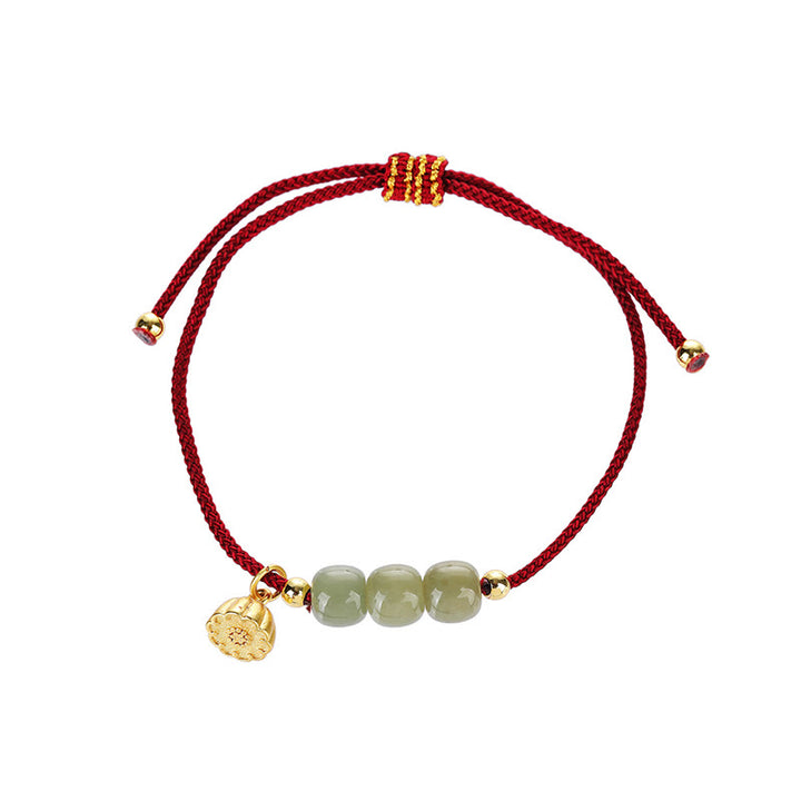 Bracelet tressé fait main en Buddha Stones de jade Hetian et gousse de lotus pour la prospérité et la chance