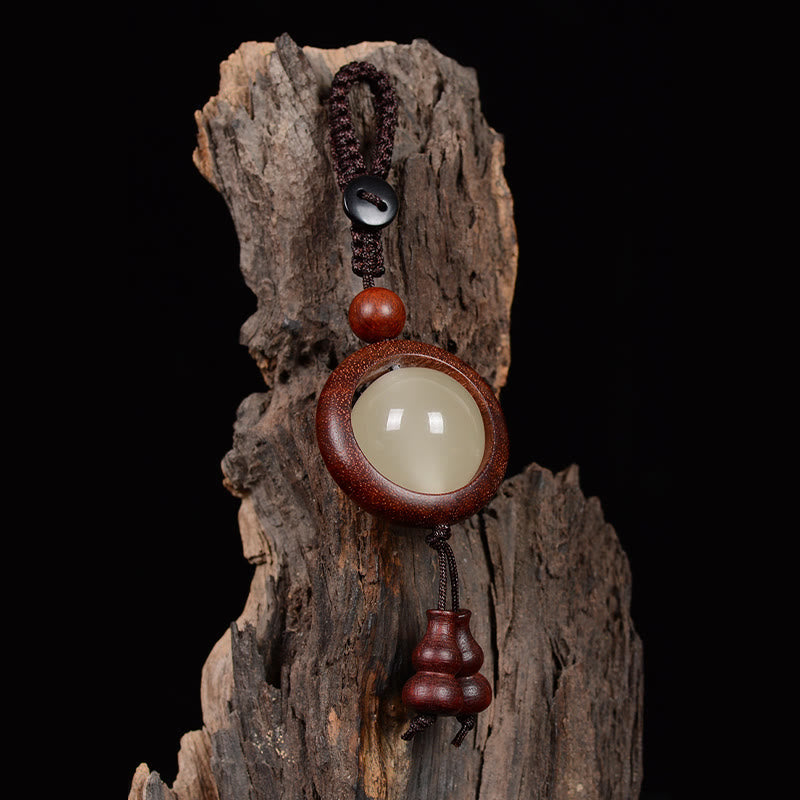 Porte-clés porte-bonheur lumineux en Buddha Stones en bois de santal rouge et bois d'ébène en bois de santal vert
