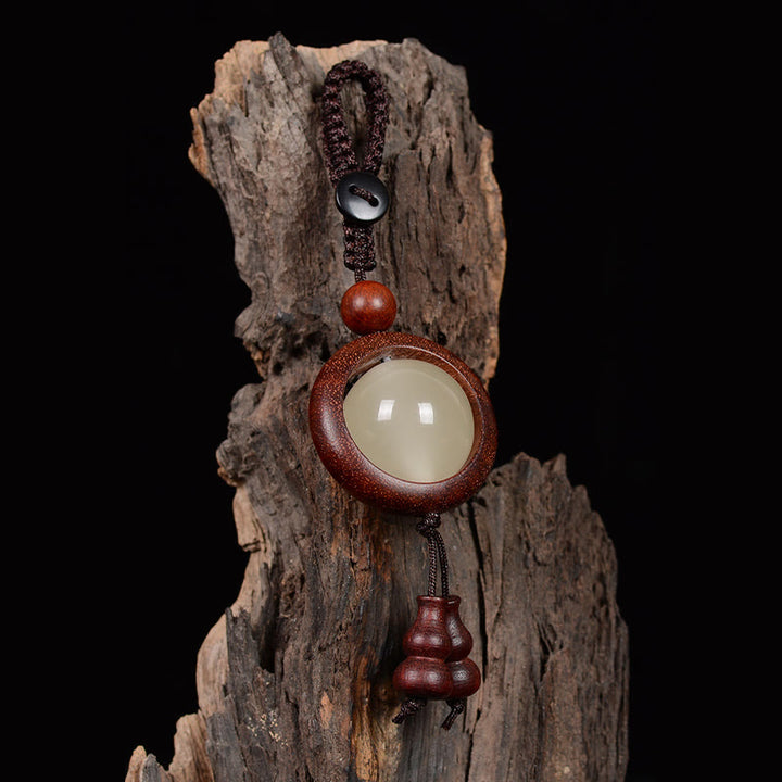 Porte-clés porte-bonheur lumineux en Buddha Stones en bois de santal rouge et bois d'ébène en bois de santal vert