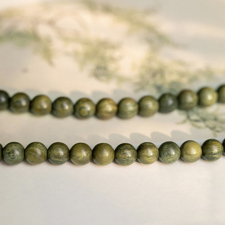 Bracelet de paix positive en bois de santal vert