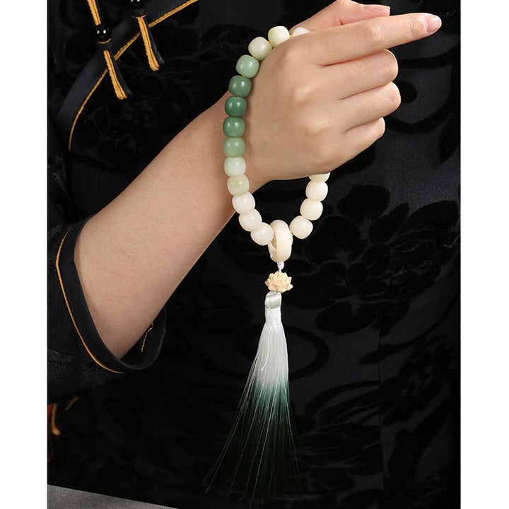 Buddha Stones Dégradé Naturel Graine de Bodhi Fortune Sac d'Argent Sagesse de Lotus Gland Poignet Mala