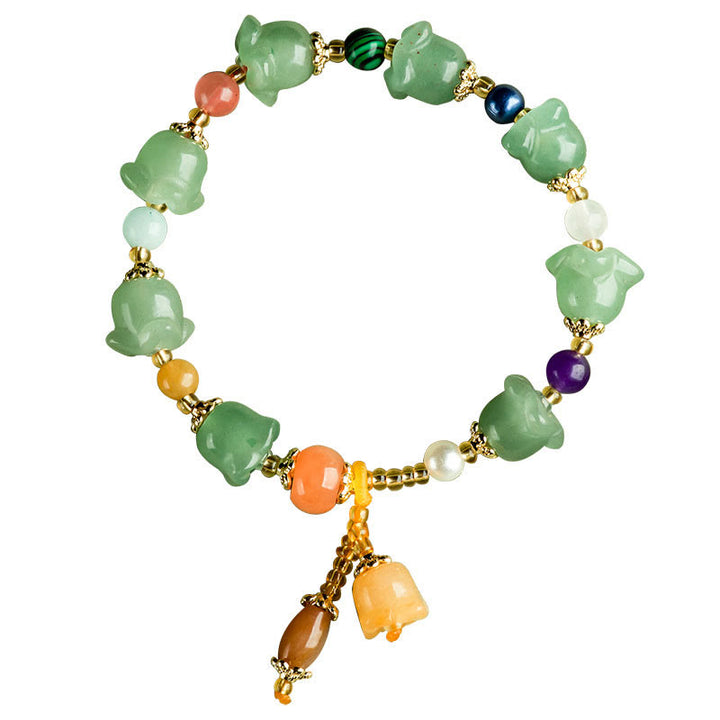 Bracelet porte-bonheur en aventurine verte et fleur de magnolia de Buddha Stones