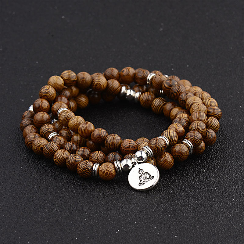 Bracelet tibétain en bois avec Buddha Stones et foudre