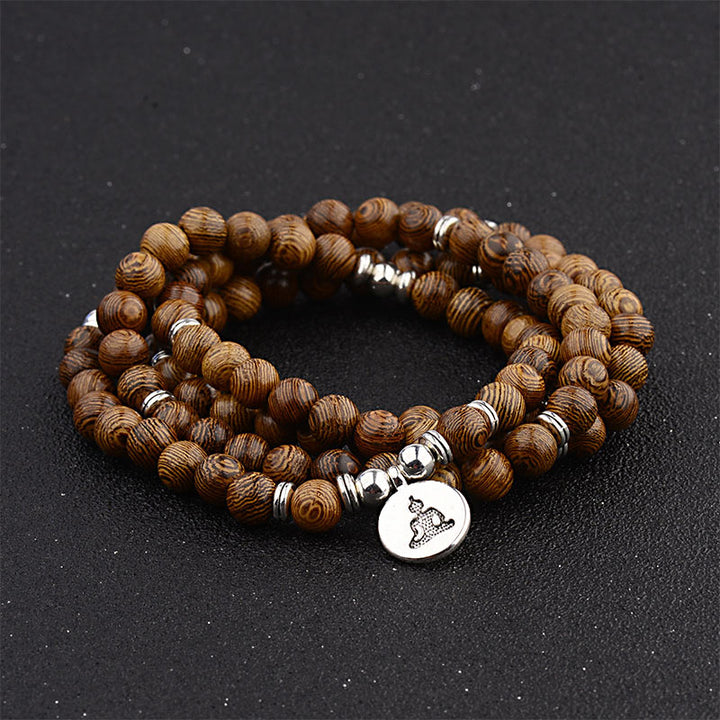 Bracelet tibétain en bois avec Buddha Stones et foudre