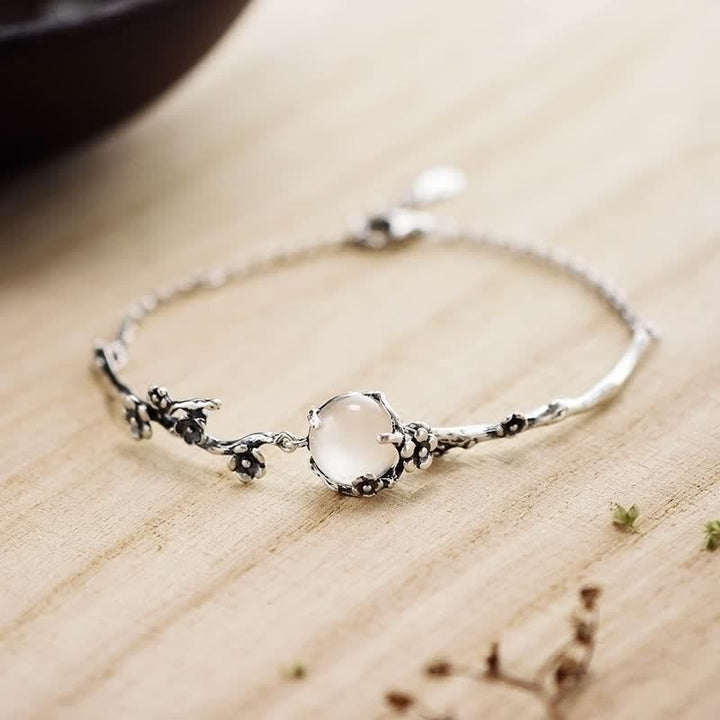 Bracelet positif en calcédoine et fleur de prunier avec Buddha Stones