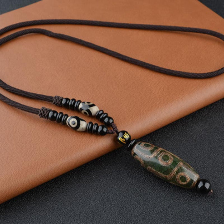 Collier de protection de richesse en perles Dzi à neuf yeux de Buddha Stones