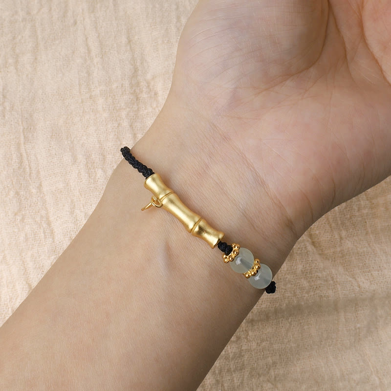 Bracelet tressé en bambou Buddha Stones et motif porte-bonheur
