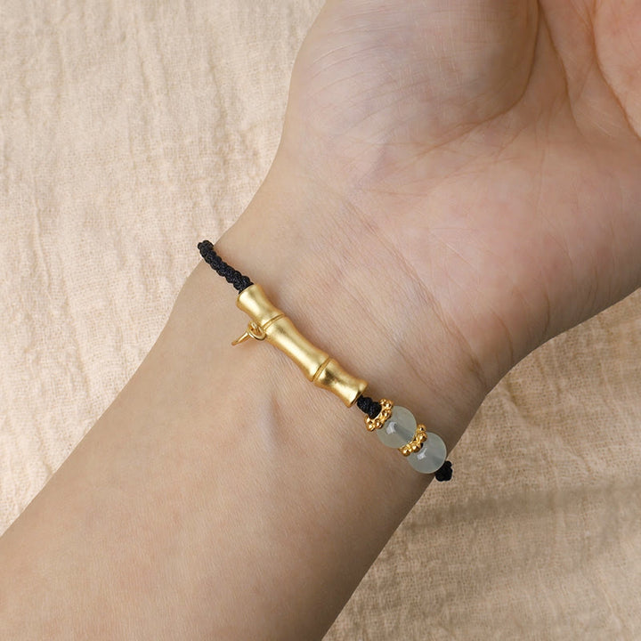 Bracelet tressé en bambou Buddha Stones et motif porte-bonheur