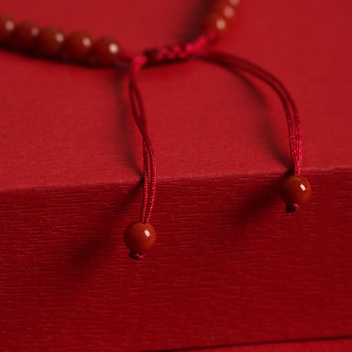 Bracelet de confiance à double boucle de paix en agate rouge naturelle et jade Hetian de Buddha Stones