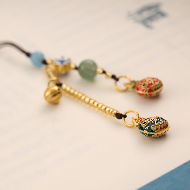 Porte-clés porte-bonheur de la famille des bêtes avaleuses d'or