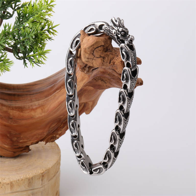Bracelet porte-bonheur en acier titane et dragon