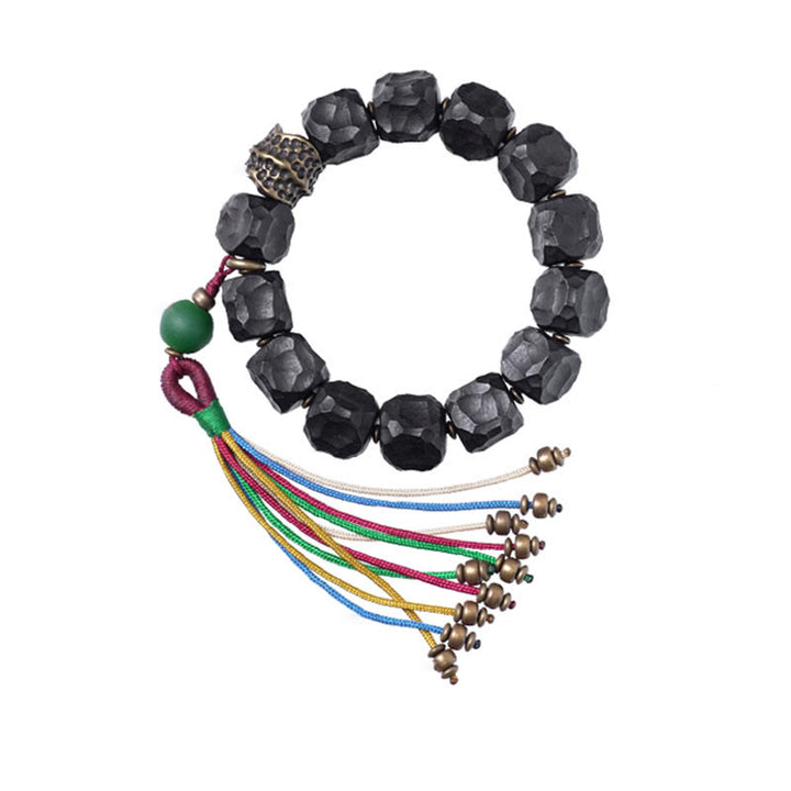 Bracelet Mala en bois d'ébène et cuivre avec Buddha Stones et pompon de paix