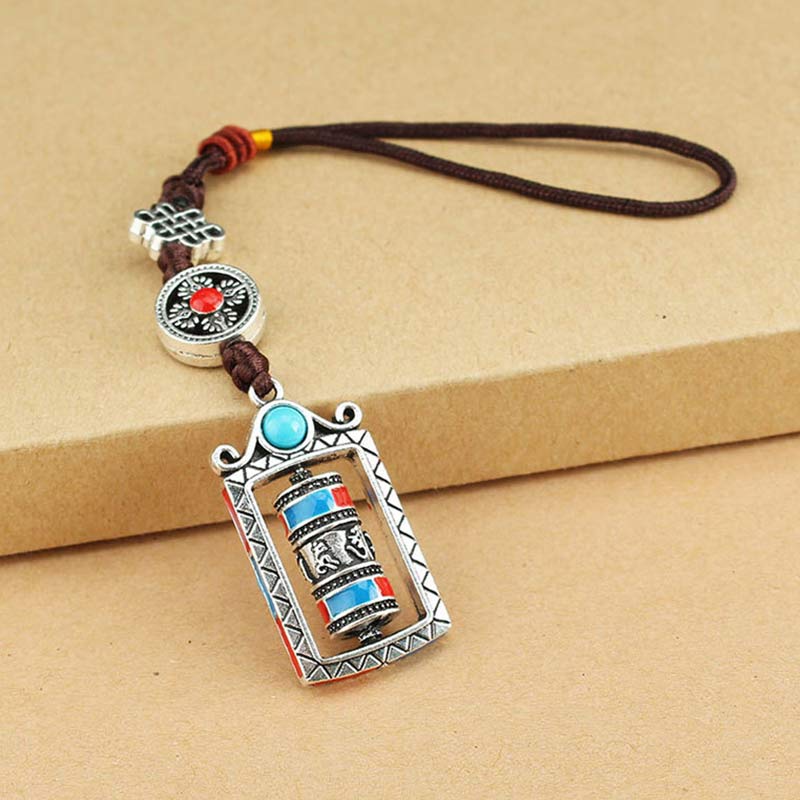 Porte-clés décoratif avec nœud rotatif et bénédiction en forme de roue de prière en six mots vrais en Buddha Stones