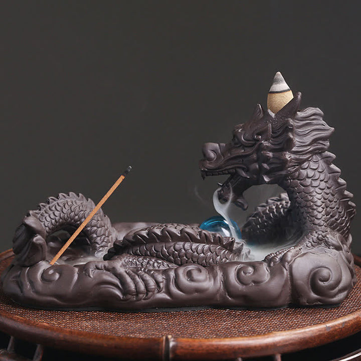 Brûleur d'encens de protection de fleur de dragon jouant à la balle