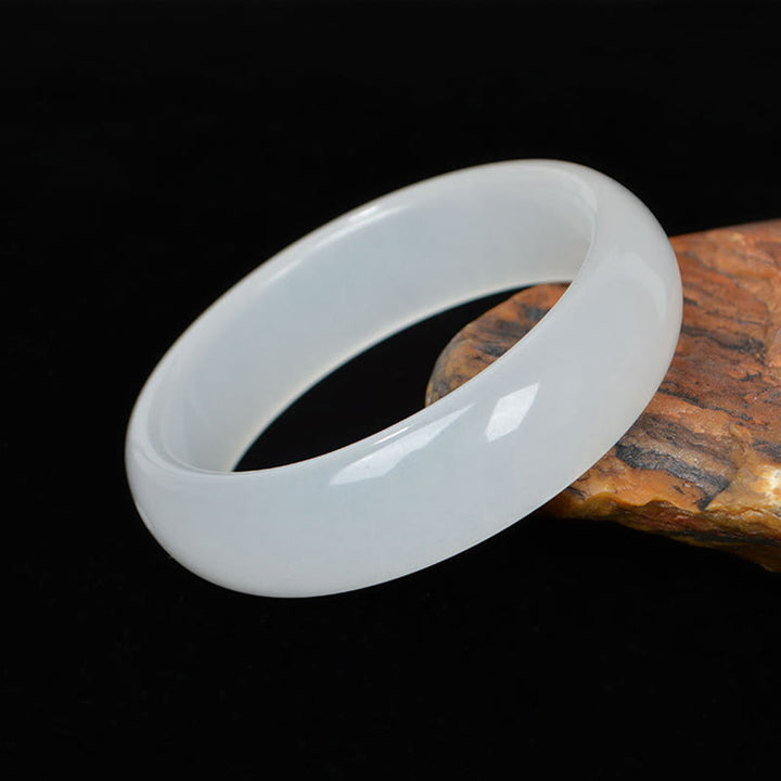 Bracelet porte-bonheur en jade doré et soie naturelle Buddha Stones