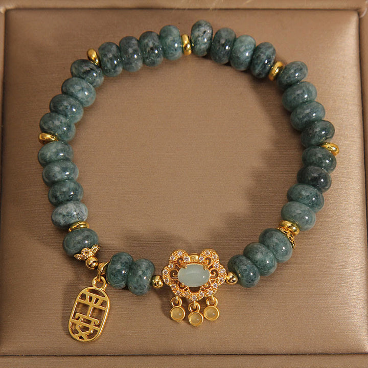 Bracelet en Buddha Stones en jade naturel avec breloque en forme de cadenas chinois, paix, chance et abondance