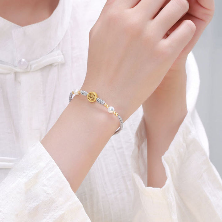 Bracelet tressé en corde bleue avec perles et arbre de fortune en cuivre et Buddha Stones