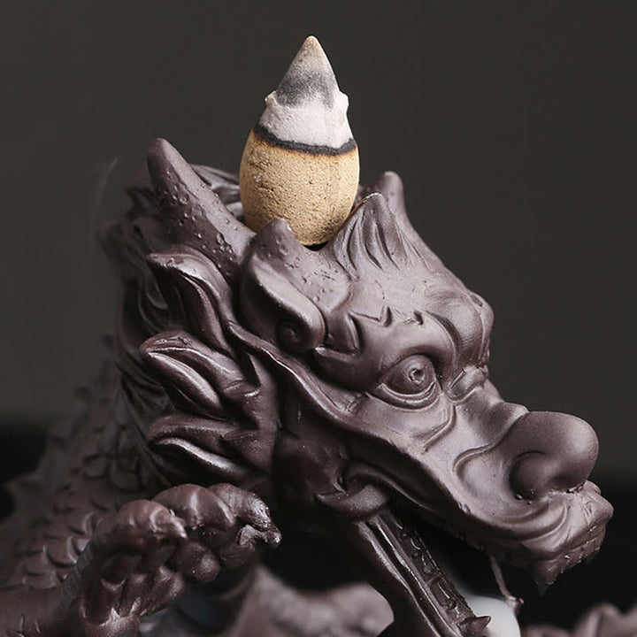 Brûleur d'encens de protection de fleur de dragon jouant à la balle