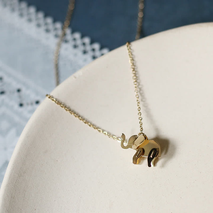 Collier porte-bonheur en acier titane avec pendentif éléphant