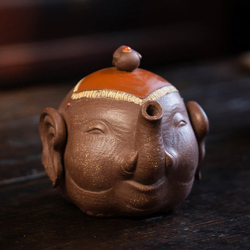 Théière en céramique et argile violette avec Buddha Stones et éléphant mignon et nuages de bon augure