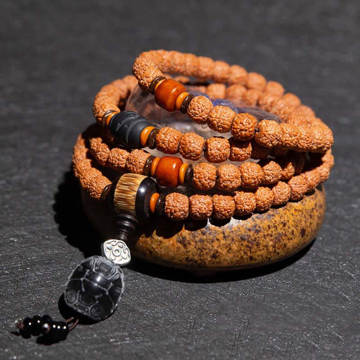 Bracelet tibétain en 108 perles de Mala Rudraksha Bodhi Seed Zodiac chinois Bouddha natal Richesse Charm