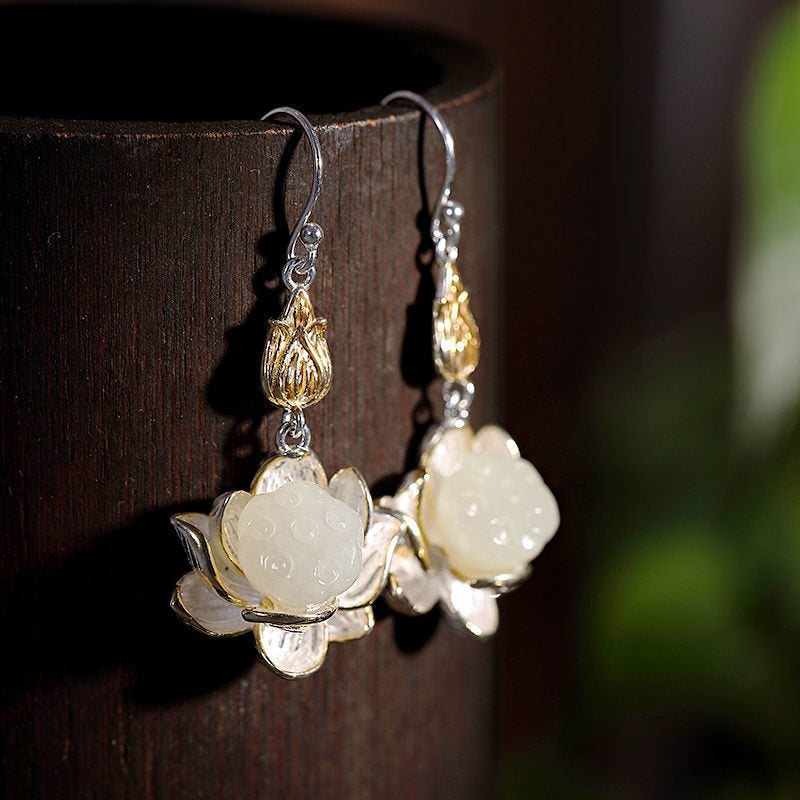 Boucles d'oreilles pendantes en jade blanc et Buddha Stones